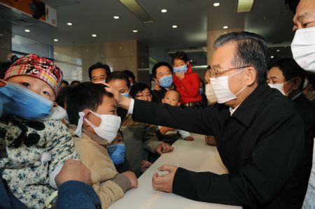 Chinese Premier Wen Jiabao (R2) talks with patients at the Beijing Children's Hospital in Beijing, capital of China, Oct. 31, 2009. Premier Wen visited A/H1N1 patients and medical staff at the Beijing Children's Hospital in Beijing on Saturday. (Xinhua/Rao Aimin) Chinese Premier Wen Jiabao (R2) talks with patients at the Beijing Children's Hospital in Beijing, capital of China, Oct. 31, 2009. Premier Wen visited A/H1N1 patients and medical staff at the Beijing Children's Hospital in Beijing on Saturday. (Xinhua/Rao Aimin)