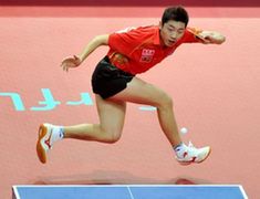 Xu Xin of China returns the ball to his compatriot Wang Liqin during the men's singles semifinal at the International Table Tennis Federation (ITTF) Pro Tour Grand Finals in Macao, south China, on Jan. 10, 2010. Xu was qualified for the final after beating Wang by 4-2. (Xinhua/Lo Ping Fai) Xu Xin of China returns the ball to his compatriot Wang Liqin during the men's singles semifinal at the International Table Tennis Federation (ITTF) Pro Tour Grand Finals in Macao, south China, on Jan. 10, 2010. Xu was qualified for the final after beating Wang by 4-2. (Xinhua/Lo Ping Fai)