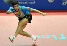 Wang Liqin of China returns the ball to his compatriot Xu Xin during the men's singles semifinal at the International Table Tennis Federation (ITTF) Pro Tour Grand Finals in Macao, south China, on Jan. 10, 2010. Wang lost the match 2-4. (Xinhua/Lo Ping Fai) Wang Liqin of China returns the ball to his compatriot Xu Xin during the men's singles semifinal at the International Table Tennis Federation (ITTF) Pro Tour Grand Finals in Macao, south China, on Jan. 10, 2010. Wang lost the match 2-4. (Xinhua/Lo Ping Fai)